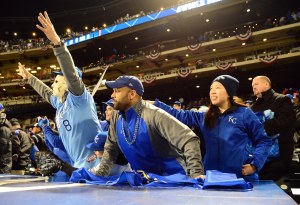 Oct 31, 2015; New York City, NY, USA; Fans of the Kansas City Royals cheer during game four of the World Series against the New York Mets at Citi Field. Mandatory Credit: Jeff Curry-USA TODAY Sports